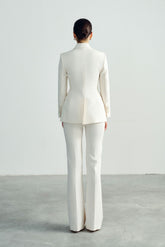 Tailored suiting fabric blazer with peak lapels and double-breasted button front